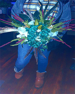 Woman Holding A Bouquet Of Flowers